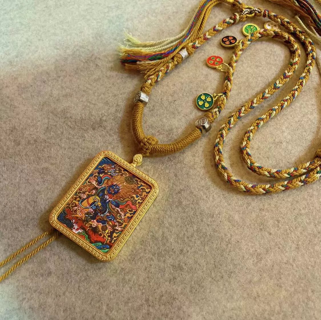 palden lhamo handcrafted gold tibetan thangka necklace with soft yarn cord4 18.jpg
