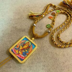 yellow jambhala god of wealth handcrafted gold tibetan thangka necklace with soft yarn cord4 11.jpg