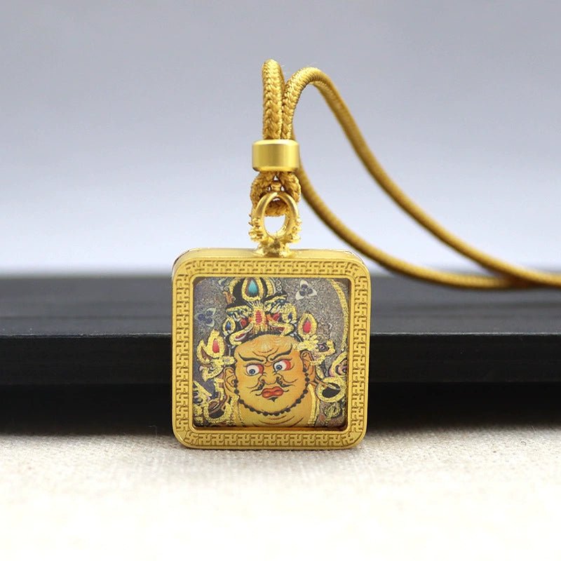 yellow jambhala (god of wealth) mini square gold tibetan thangka pendant – sacred protection amulet (gold leaf decorated) yellow jambhala (god of wealth) mini square gold tibetan thangka pendant – sacred protection amulet (gold leaf decorated)